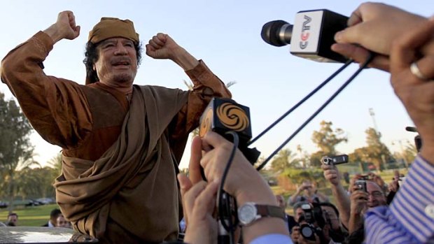 Muammar Gaddafi . . . rebels say his regime has killed 10,000.