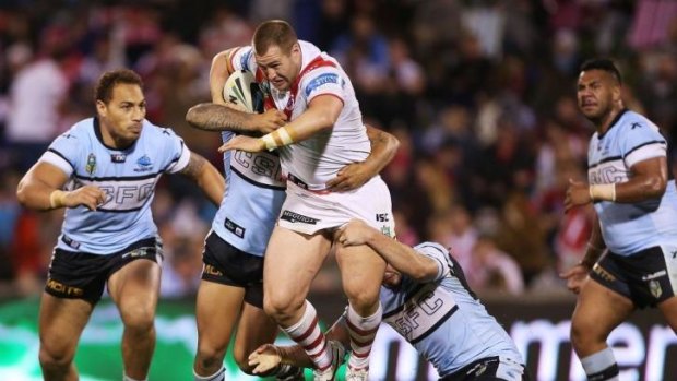 Metre-eater: Trent Merrin made a massive 264 metres during a 47-minute stint against Cronulla on Saturday.