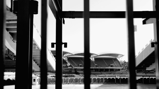 The closed gates at Adelaide Oval on Sunday after the Geelong game was cancelled following the death of Adelaide coach Phil Walsh.