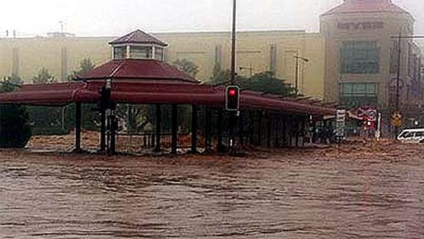 Water rages through the intersection of Victoria and Margaret streets in Toowoomba.