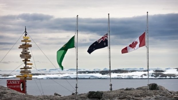 Flags at half mast at Casey station on Antarctica.