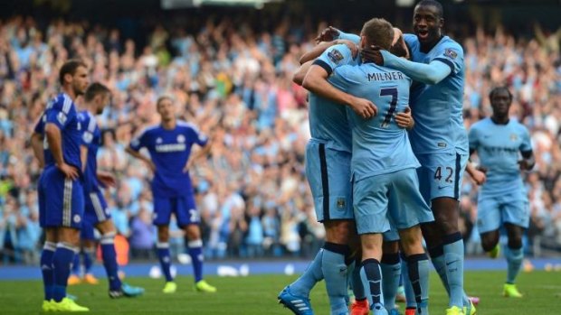 Manchester City players celebrate with goal-scorer Frank Lampard.