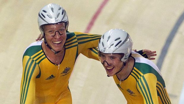 Dale Parker (left) and Cameron Meyer congratulate each other after winning gold in the men's track cycling team pursuit event at the Commonwealth Games in New Delhi in October last year.