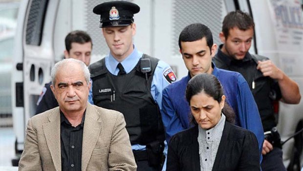 Accused  ... Mohammad Shafia, left, with his son Hamed, in the dark blue shirt, and Mohammed Shafia's second wife Tooba Mahommad Yahya.
