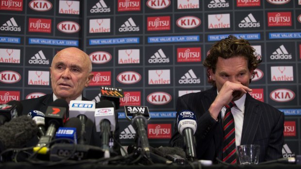 James Hird and Paul Little make the announcement.