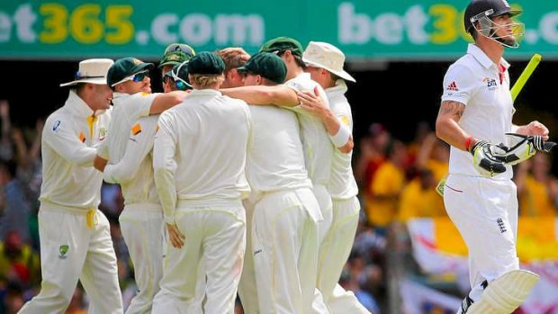 Poor form: Australia celebrate the dismissal of England batsman Kevin Pietersen.