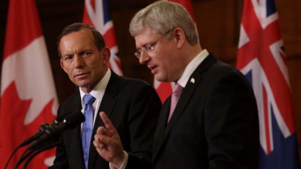 Prime Minister Tony Abbott with Canadian Prime Minister Stephen Harper both say there is no need for carbon pricing to combat climate change.