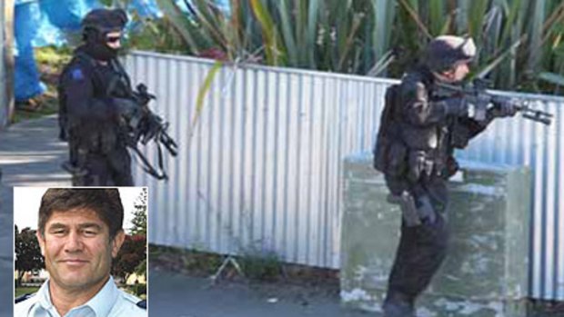 Armed police outside the Napier house where Senior Constable Len Snee (inset) was shot dead.