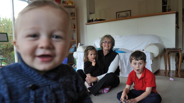 Noella Steinfort and her grandchildren, Rory, 1, Maggie, 3, and Liam, 5.