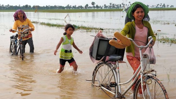 Deluge ... massive floods have ravaged parts of Asia's rice bowl.
