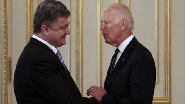 Building alliances: Ukrainian President Petro Poroshenko (left) with US Vice-President Joe Biden in Kiev on Saturday. "America's with you," Mr Biden said. "That is not hyperbole."