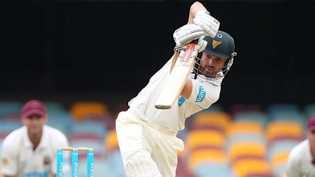 Cowan of the Tigers bats during day three of the Sheffield Shield match between the Queensland Bulls and the Tasmania Tigers at The Gabba on March 18, 2012 in Brisbane, Australia.