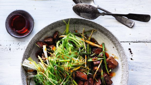 Stir-fried lamb with spring onions. 