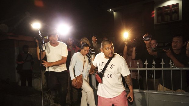 Michael Chan (right) with his girlfriend Phoebe leaves Kerobakan Prison after attempting to see his brother Andrew Chan prior to his transfer from Bali, Indonesia. 