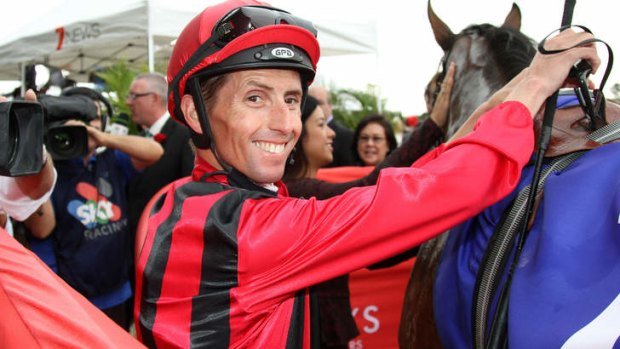 Reason to smile: Nash Rawiller after winning the group 1 J.J. Atkins on Romantic Touch in Brisbane this month. He has a good book of rides at Rosehill on Saturday.