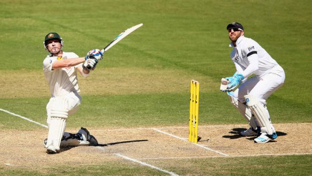 Dose of speed: Brad Haddin hits a six in Adelaide.