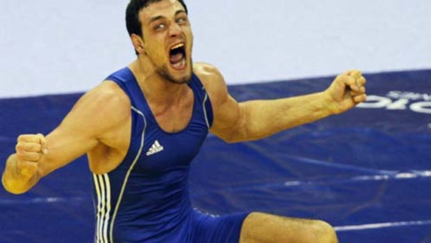 Ivan Popovic has won Australia's first gold medal in 32 years in wrestling.