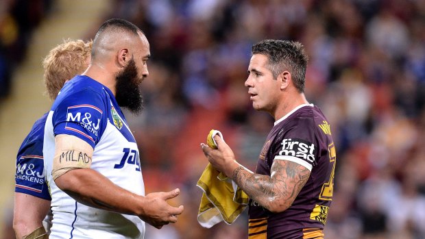 Taking the plea: Sam Kasiano and Corey Parker after the Brisbane captain was kicked in the face by the Bulldogs forward after a tackle.