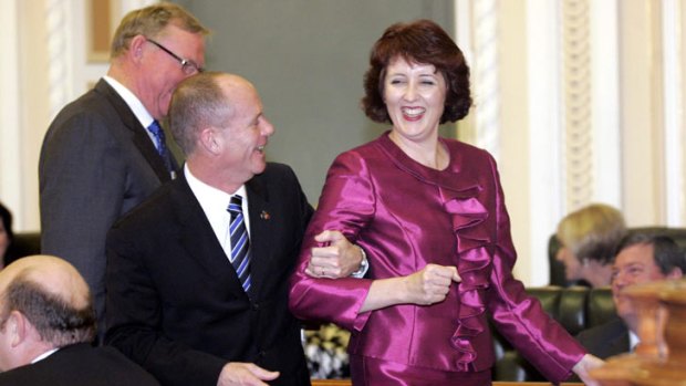 Premier Campbell Newman leads Fiona Simpson to the Speaker's chair.