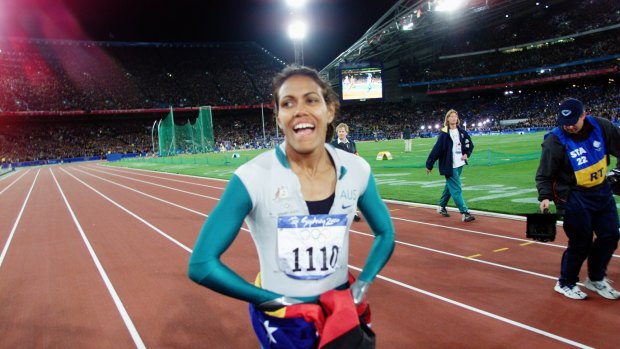 Magical time: Cathy Freeman wins gold medal in the women's 400 metres.