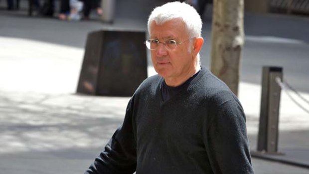 A falling out ...  the property developer Ron Medich in Martin Place yesterday after visiting his lawyer.