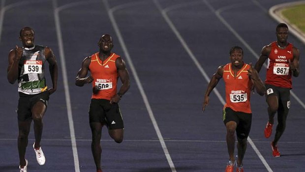 Usain Bolt (left) is beaten by friend Yohan Blake (2nd from right) in the 200m at the Jamaican Olympic trials.