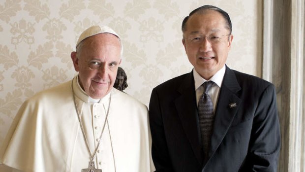 Pope Francis with World Bank's President Jim Yong Kim as they meet at the Vatican.