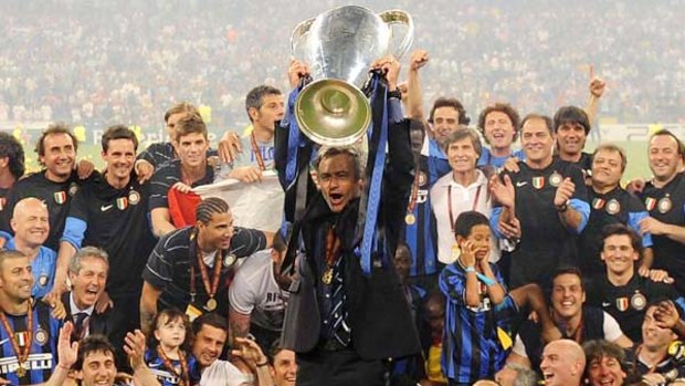 Jose Mourinho and the trophy.