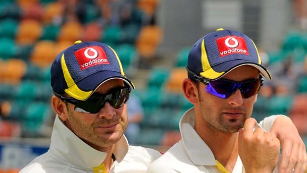 The target: Nathan Lyon (right) with Australian captain Michael Clarke.