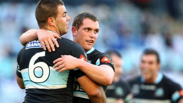 Gone bush: Stuart Flanagan (right), during his time with the Sharks, with current Cronulla player Wade Graham.