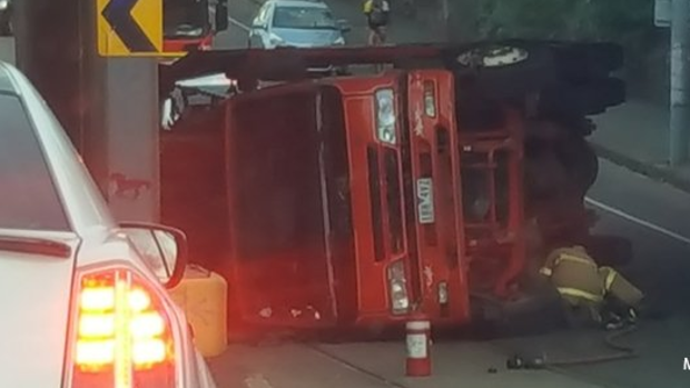 A truck has rolled over in Essendon, causing major delays. 