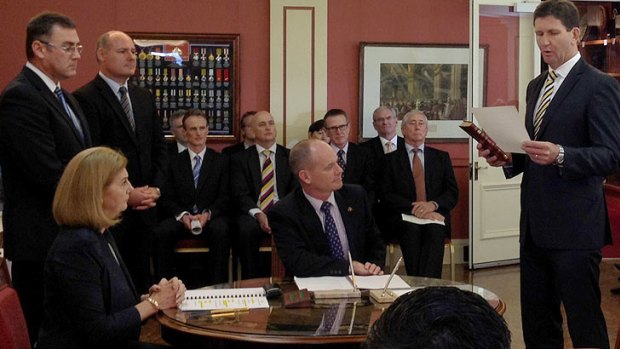 New Health Minister Lawrence Springborg is sworn in.