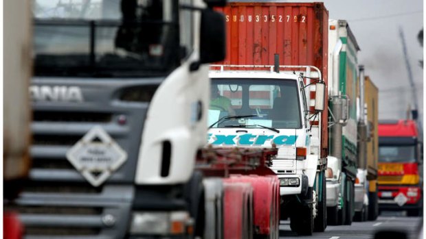 Trucks travel along  Francis St Yarraville.