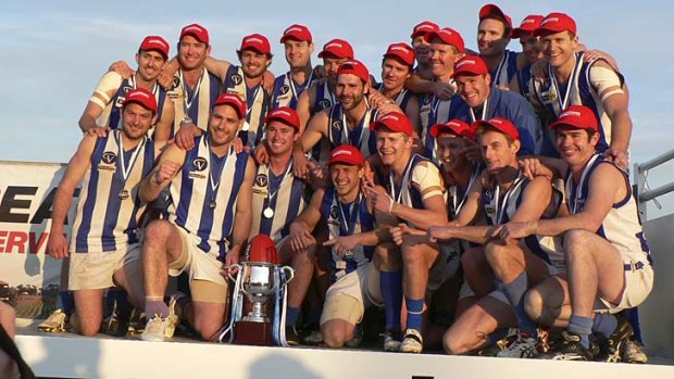 The Kangaroos last year, with Tim Vallance (third from left front row) and Scott Munro (far right front row).