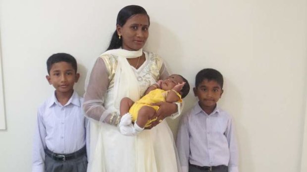 Ranjini, with boys Kumaran, 9, and Kathir, 7, and baby boy Paari.