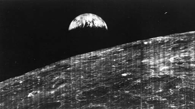 The first view of Earth from the moon on August 23, 1966.