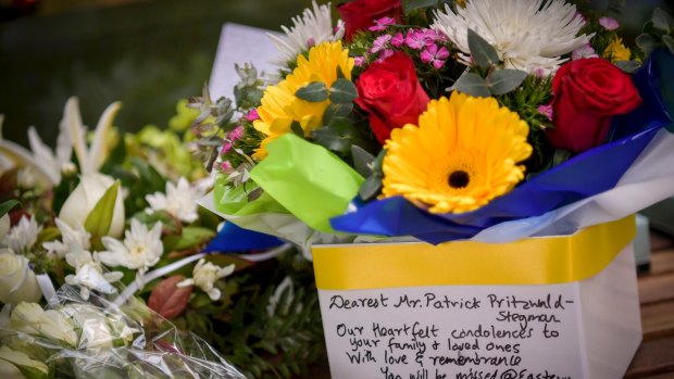 Flowers were laid outside Box Hill Hospital after Dr Patrick Pritzwald Stegmann died.