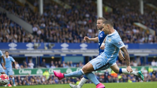 Opener: Aleksandar Kolarov scores the first goal in Manchester City's 2-0 win.