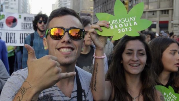 New rules: People participate in the so-called "Last demonstration with illegal marijuana" on their way to the Congress building in Montevideo.