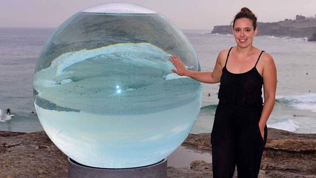Talk of the town: Sydney artist Lucy Humphrey with her popular sculpture <i>Horizon</i>.