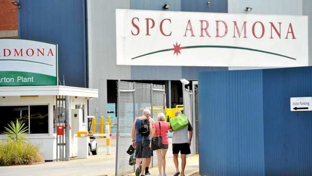 Crews arrive for work at the SPC Ardmona factory in Shepparton.