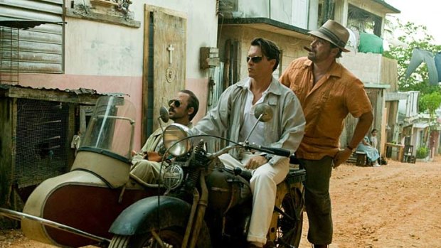 Road to debauchery ... 1960s Puerto Rico is just the place for some patented gonzo mayhem courtesy of Johnny Depp, centre.