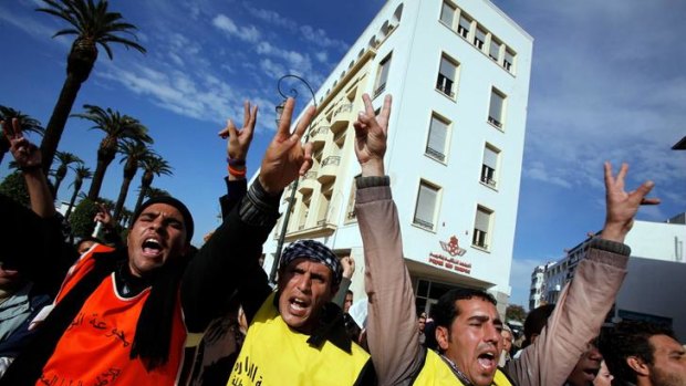 Unemployed graduates take part in a demonstration calling for a boycott of parliamentary elections, in Rabat.