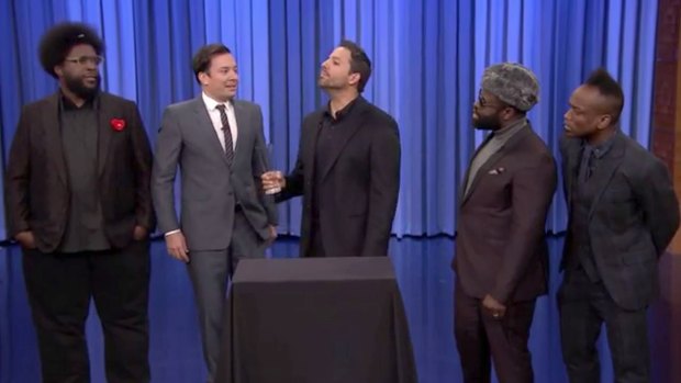 Jimmy Fallon with magician David Blaine and The Roots.