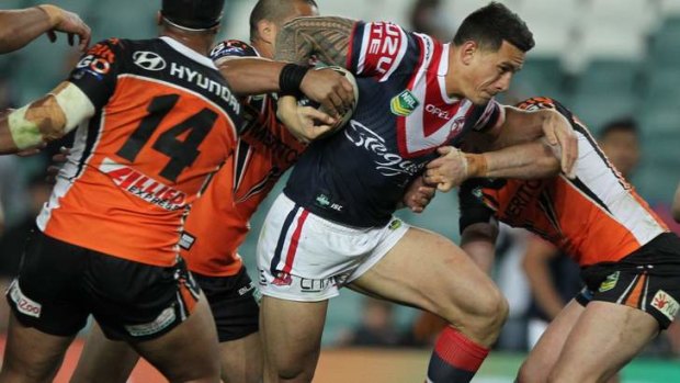 Powerhouse: Sonny Bill Williams ploughs through the Tigers' defence.