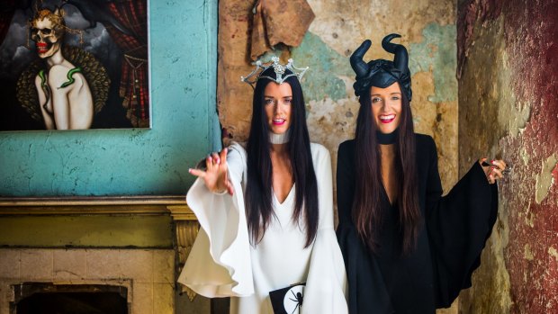 Jess (in black) and Steph Dadon, fashion bloggers from How Two Live. Halloween is coinciding with Derby Day and some designers and race-goers are getting in to the spirit with skull and crossbone jewellery, themed millinery etc. 