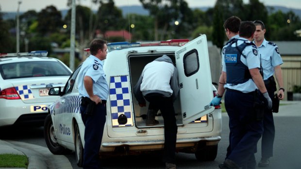 In Traralgon, a man with questions to answer is led into a divisional van after an incident.
