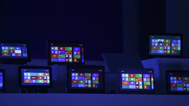 The Windows 8 software homepage is displayed on tablet devices at the Microsoft Windows 8 software consumer preview event at the Mobile World Congress in Barcelona in February, 2012.