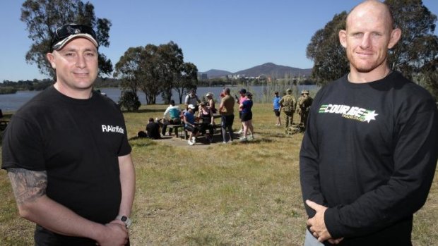 Healthy exercise: James Hellyer, left, and Ian Bone take a break from the ANZAC Warriors Walk.  Current and former Navy, Army and Air Force members are walking 80km around Lake Burley Griffin to raise funds and awareness of PTSD.