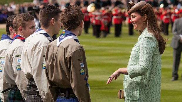 Catherine, Duchess of Cambridge, speaks with participants during the National Review of Queen's Scouts at Windsor Castle in Berkshire.